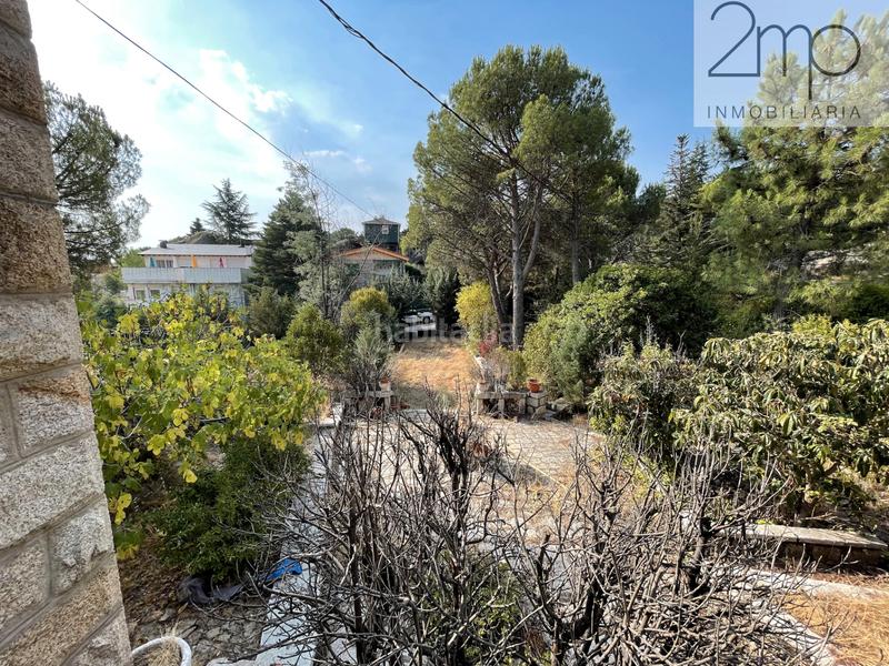 Foto ba7b9171-9740-49ae-929a-40e3c1bc5d33. Terreny residencial a Manzanares el Real