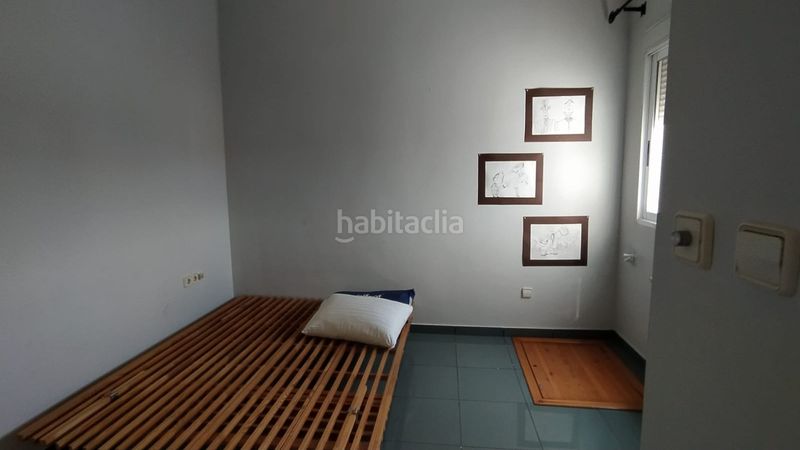 Foto 42c5400b-ef3a-40cb-a060-bb11b48f7e88. Casa aparellada amb xemeneia calefacció aparcament a Manises