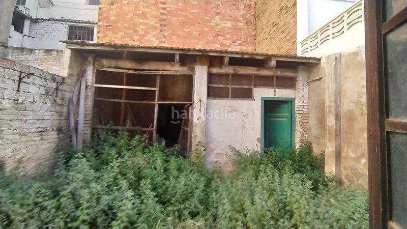 Foto ede50c84-ded8-4d36-beb2-ef6becc58f19. Casa adossada amb xemeneia a La Constitución-Canaleta Mislata