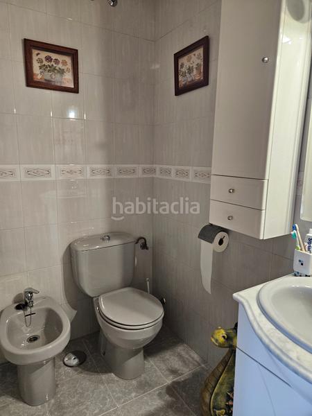 Foto 4432ea0a-1fce-4706-bcca-2ae2499b91e9. Casa a schiera con camino riscaldamento in Ensanche Alcalá de Henares