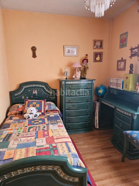 Foto af53c06e-3fee-4cc5-813e-4bd27ff79aab. Casa a schiera con camino riscaldamento in Ensanche Alcalá de Henares