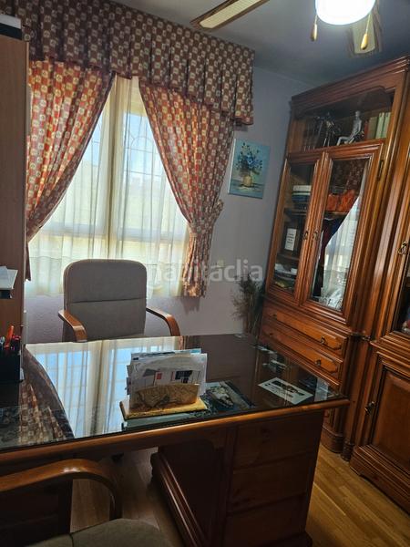 Foto bab9a0ad-2130-4b98-ab38-fa24731a50b9. Casa adossada amb xemeneia calefacció a Ensanche Alcalá de Henares