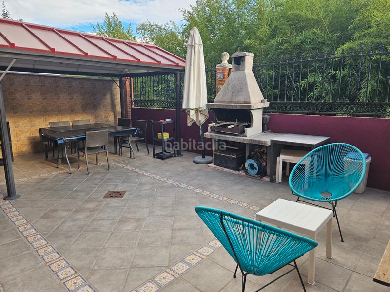 Foto 6c973654-2e21-4acb-90ca-76b8d91356e0. Maison jumelée avec cheminée chauffage dans Ensanche Alcalá de Henares