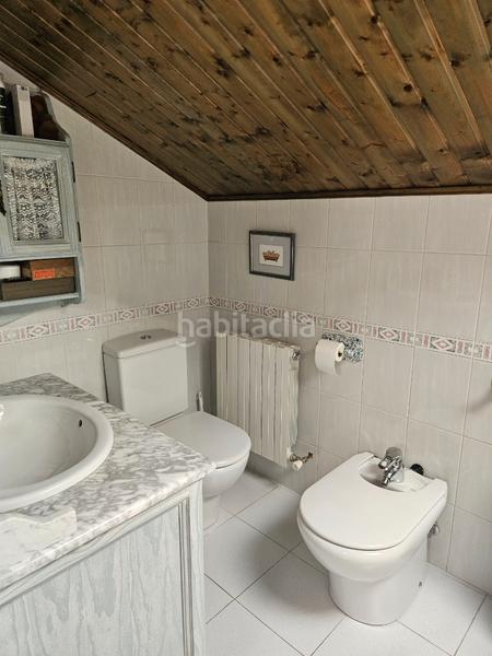 Foto 6720d9f3-b286-495c-abb3-51d4334ee1a7. Semi detached house with fireplace heating in Ensanche Alcalá de Henares