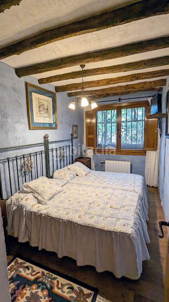 Foto 234cee8f-a1e7-4602-b0de-7c419cd8814b. Casa amb xemeneia calefacció a Sotosalbos