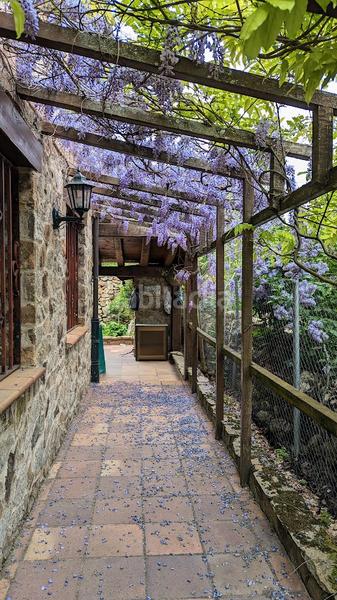 Foto f24bb8aa-71bb-4e5c-bc6a-99ba6a14eb76. Casa amb xemeneia calefacció a Sotosalbos