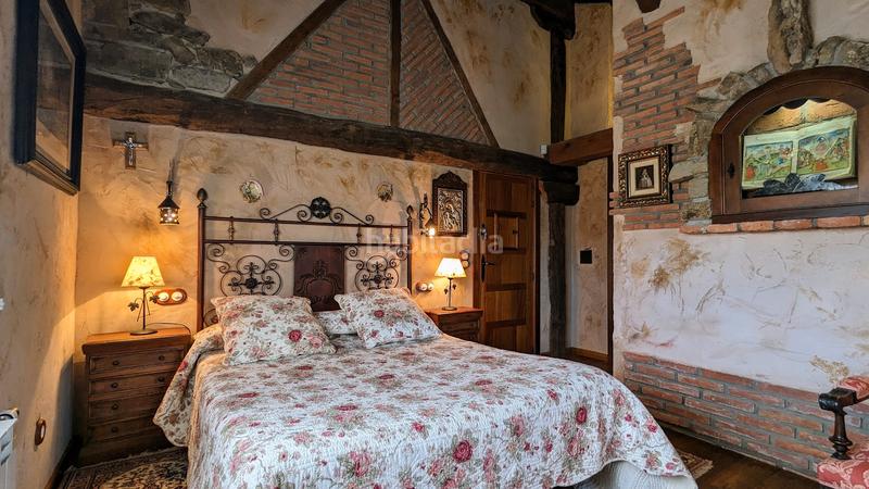 Foto f405cdb3-f78b-42c7-8fcc-cae96ad7bfd1. Casa amb xemeneia calefacció a Sotosalbos