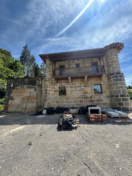 Foto ef8b2314-ff1c-47a8-81b3-60cc4649f2c5. Casa amb xemeneia calefacció piscina a Ribamontán al Monte