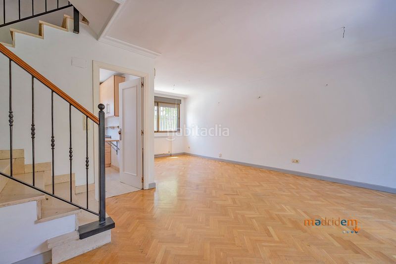 Foto 1d9c64c0-67d5-458f-84f6-1a5bcb62637e. Casa adossada amb calefacció a Concepción Madrid