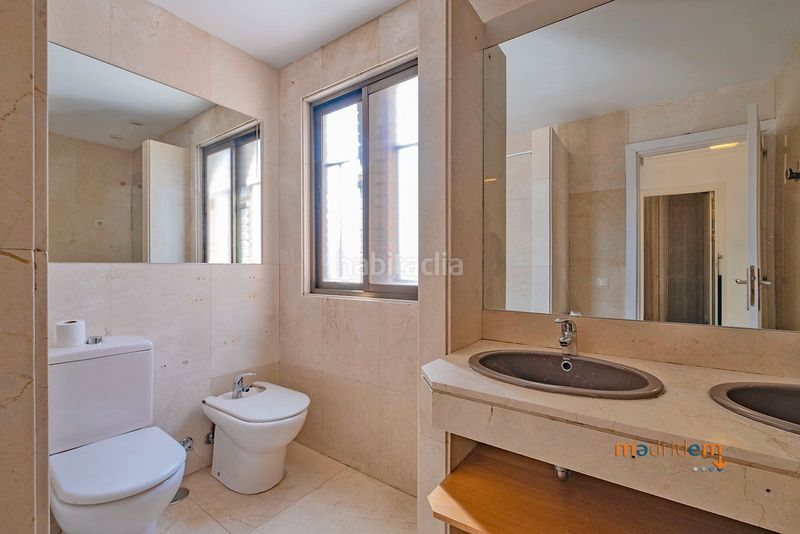 Foto 356682a8-02f9-4c33-95d4-d10ee8acddaf. Casa adossada amb calefacció a Concepción Madrid