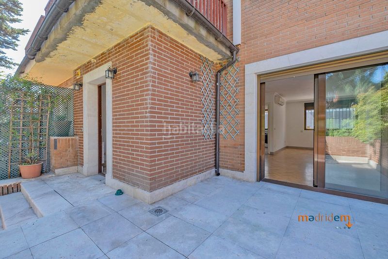 Foto 72c2d25f-003d-4357-8ade-3d4530db6b5c. Casa adossada amb calefacció a Concepción Madrid