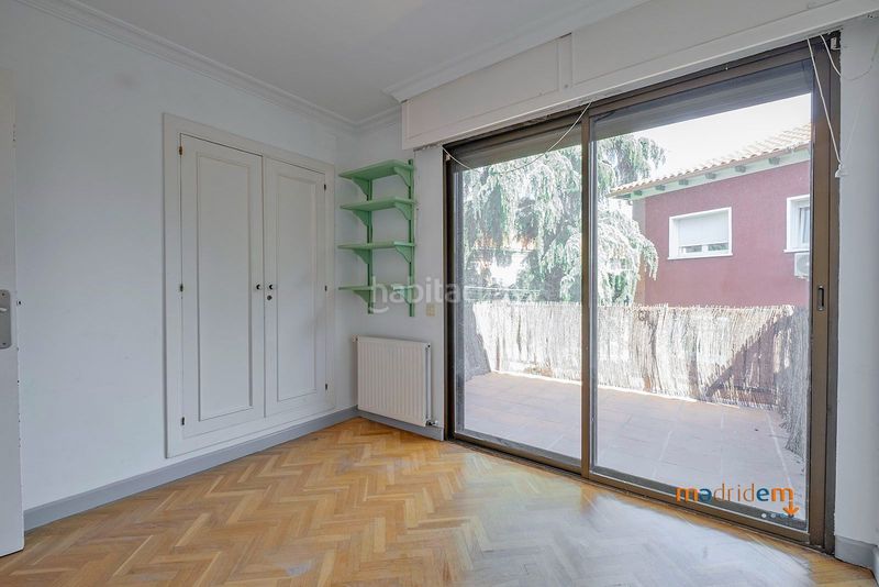 Foto 8e2ced5a-a7ec-43ca-81a6-9a7b4c7f639f. Casa adossada amb calefacció a Concepción Madrid