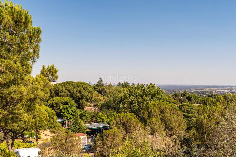 Foto 2a3bd8dc-69d0-4035-8f25-f0155b775a3e. Xalet amb xemeneia calefacció aparcament piscina a Torrelodones