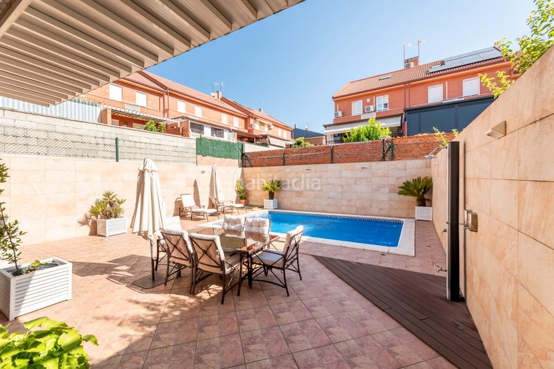 Foto 19cbc44f-67f6-4468-81ac-3a7db0fbb3fb. Casa aparellada amb calefacció aparcament piscina a Arroyomolinos