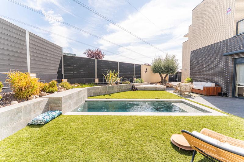 Foto b4a04445-214f-4af3-aa4b-2651cdfb3385. Casa bifamiliare con riscaldamento parcheggio piscina in Arroyomolinos