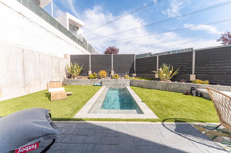 Foto f942b89e-c52e-4372-9d7c-f148cb806722. Casa bifamiliare con riscaldamento parcheggio piscina in Arroyomolinos