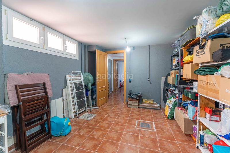 Foto 0bddbd4d-e2ca-4916-9256-c19a71489a8a. Casa aparellada amb xemeneia calefacció aparcament piscina a Navalcarnero