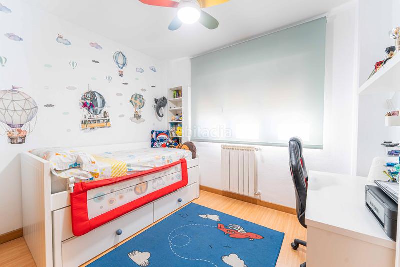 Foto f8b0da48-658b-4aac-bcb6-0b94dad5c99b. Casa aparellada amb xemeneia calefacció aparcament piscina a Navalcarnero