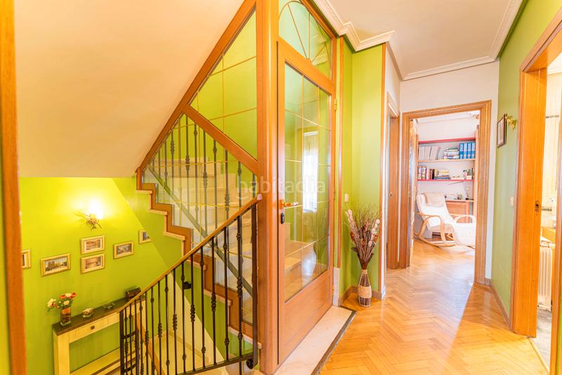 Foto aef99400-8835-46d9-bc3c-993701e2c497. Casa bifamiliare con camino riscaldamento parcheggio piscina in Móstoles