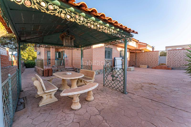 Foto a1a18842-d97c-46ee-8635-c3ce49f56e82. Chalet con camino riscaldamento parcheggio in Álamo (El)