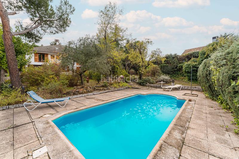 Foto 7ab2e3c8-f6d2-47d4-8bd1-960f5b3ac548. Chalet con camino riscaldamento parcheggio piscina in Boadilla del Monte