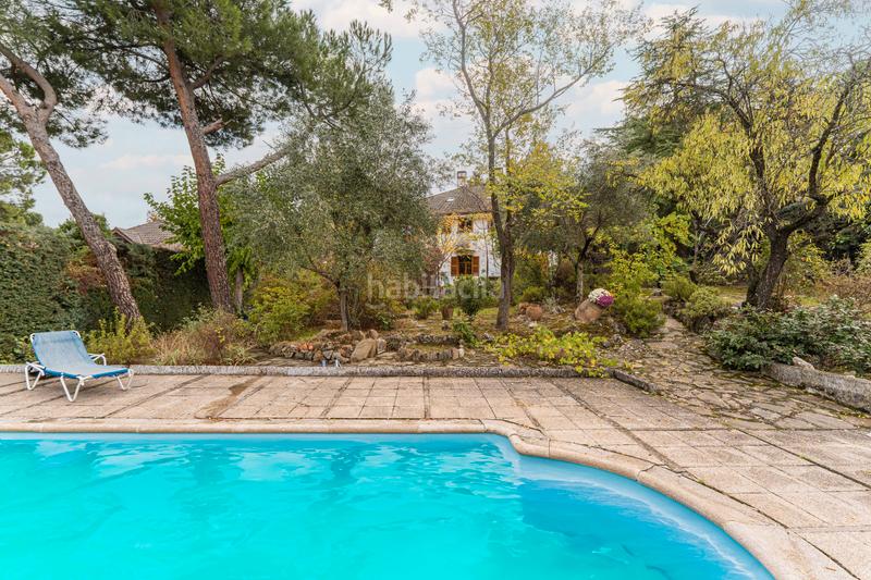 Foto fa808b5d-b06d-4851-b60a-48392dfc5899. Chalet con camino riscaldamento parcheggio piscina in Boadilla del Monte