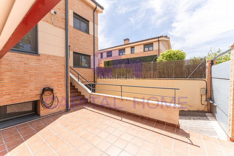 Foto 1b4447e0-ad3d-4a2e-9e7d-397d6450543b. Casa aparellada amb calefacció aparcament piscina a Navalcarnero