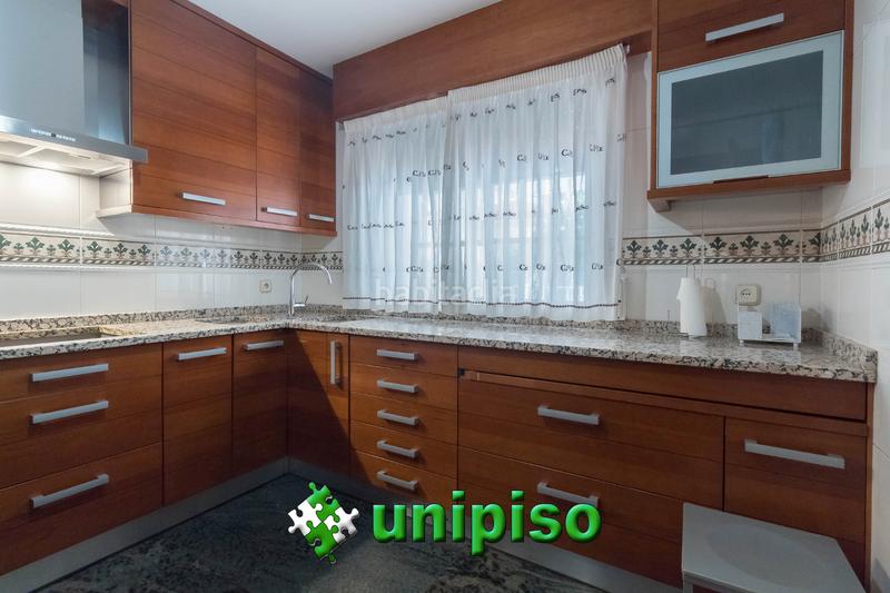 Foto e193f31d-a05a-4d07-a50e-cdf652040bb6. Casa adossada amb calefacció aparcament piscina a Leganés