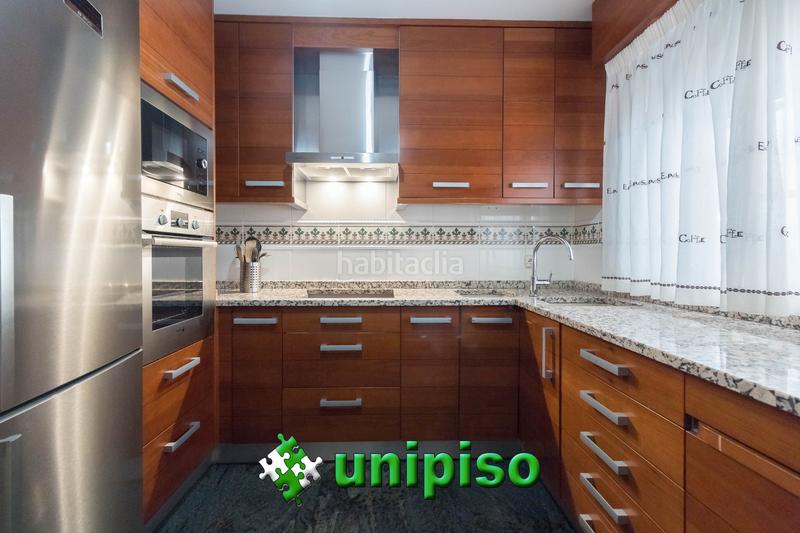 Foto d4ecef7a-2950-4875-8d53-c486ed3a5343. Casa adossada amb calefacció aparcament piscina a Leganés