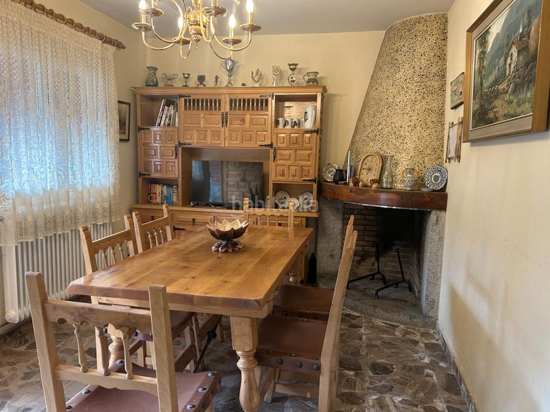 Foto 10a3b62b-810d-4352-b7c3-1a9f66624c23. Casa aparellada amb xemeneia calefacció aparcament a Navas del Rey