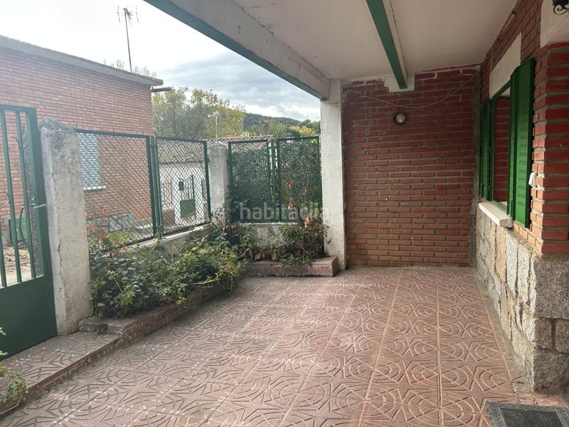 Foto 7245c554-7ad0-421e-969c-e2e65d3d85ec. Casa aparellada amb xemeneia calefacció aparcament a Navas del Rey