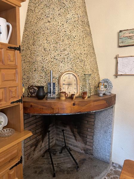 Foto 8c2b03a2-a436-4d9b-9d98-6ccf58ad09ae. Casa aparellada amb xemeneia calefacció aparcament a Navas del Rey