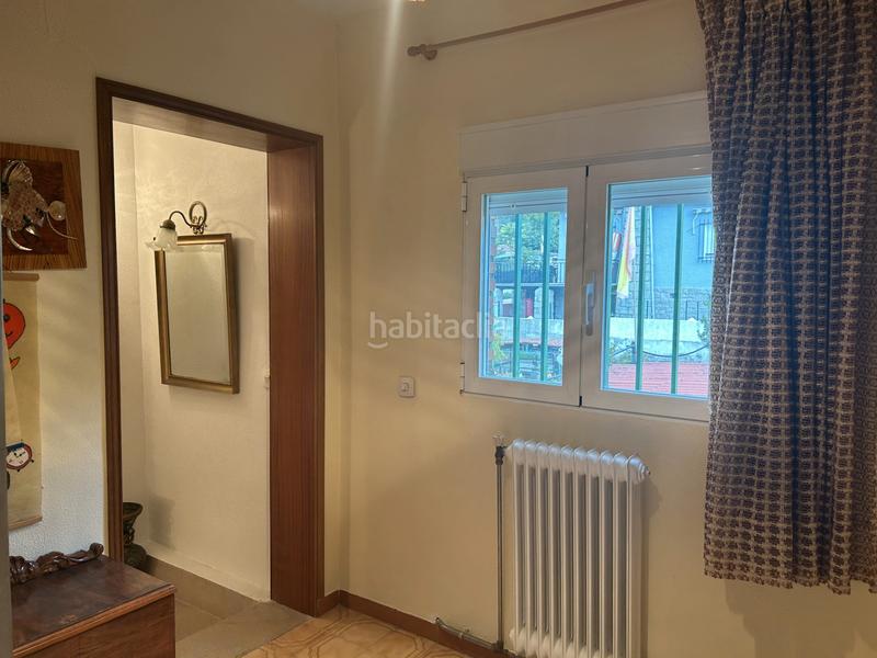 Foto e717be3f-b51e-4ae4-899b-14816968a7bf. Casa aparellada amb xemeneia calefacció aparcament a Navas del Rey