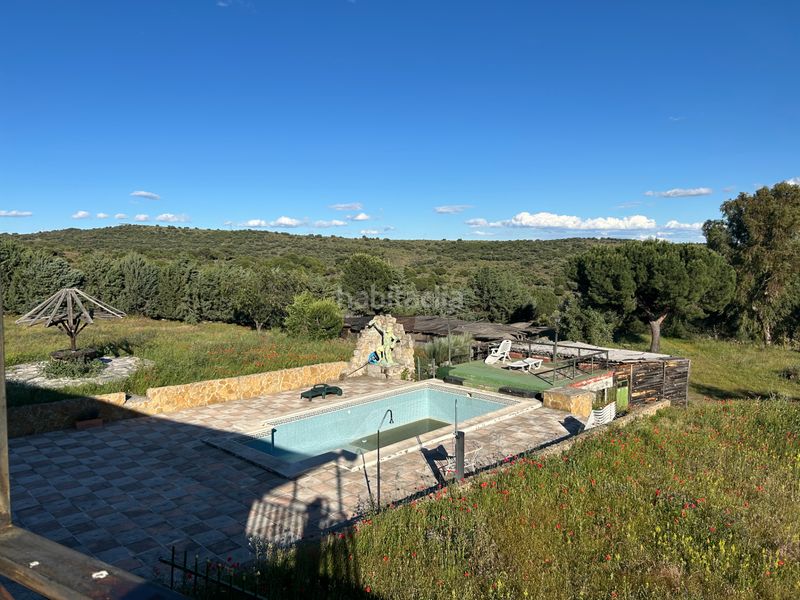 Foto 18e63a58-cd79-4649-8078-887a0212e0c0. Masia amb xemeneia calefacció piscina a Navas del Rey