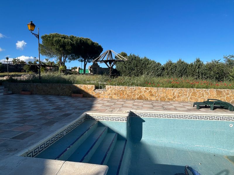 Foto ba75727e-ecb0-4b22-8453-4cd1c62722c9. Masia amb xemeneia calefacció piscina a Navas del Rey