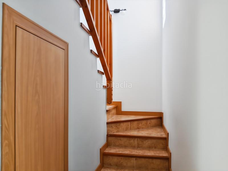 Foto 0d8864d1-8b3f-49ec-9665-5cb7a52d2eb0. Casa aparellada amb xemeneia calefacció aparcament piscina a Rivas - Vaciamadrid