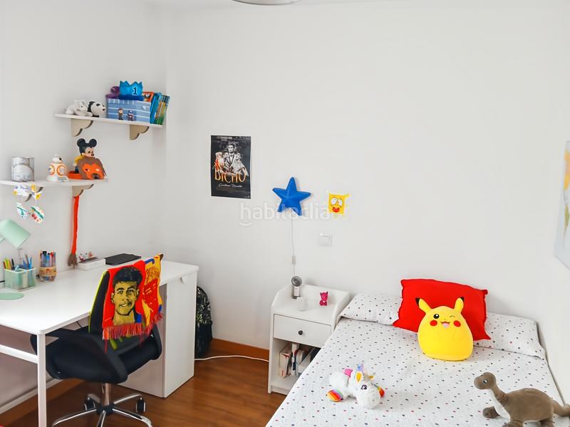 Foto 40f51c24-00ac-465c-a4f2-1fead26a9873. Casa aparellada amb xemeneia calefacció aparcament piscina a Rivas - Vaciamadrid