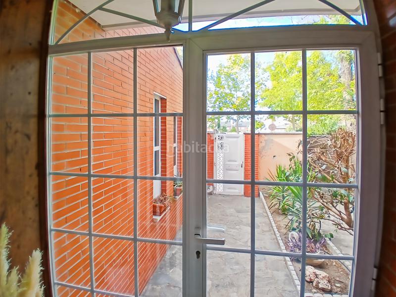 Foto 42e1d42c-0a89-4ece-9c00-df1e3b2deeee. Casa aparellada amb xemeneia calefacció aparcament piscina a Rivas - Vaciamadrid