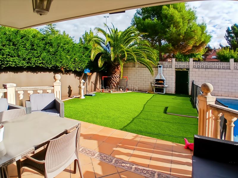 Foto 599ab428-6928-4017-ac91-3c6be77bed9d. Casa aparellada amb xemeneia calefacció aparcament piscina a Rivas - Vaciamadrid