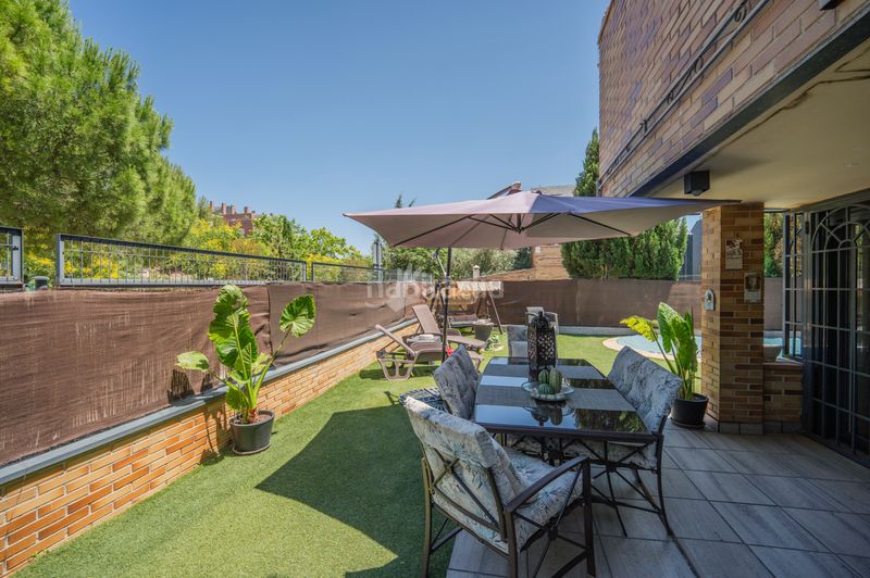 Foto b1d1a6fc-cd28-4023-bd80-76e9a66667e9. Casa amb aparcament piscina a Centro Rivas - Vaciamadrid