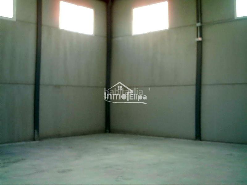 Foto a8b79778-93a3-4429-b22b-41e155d7f09a. Bâtiment à usage industriel dans Chapinería