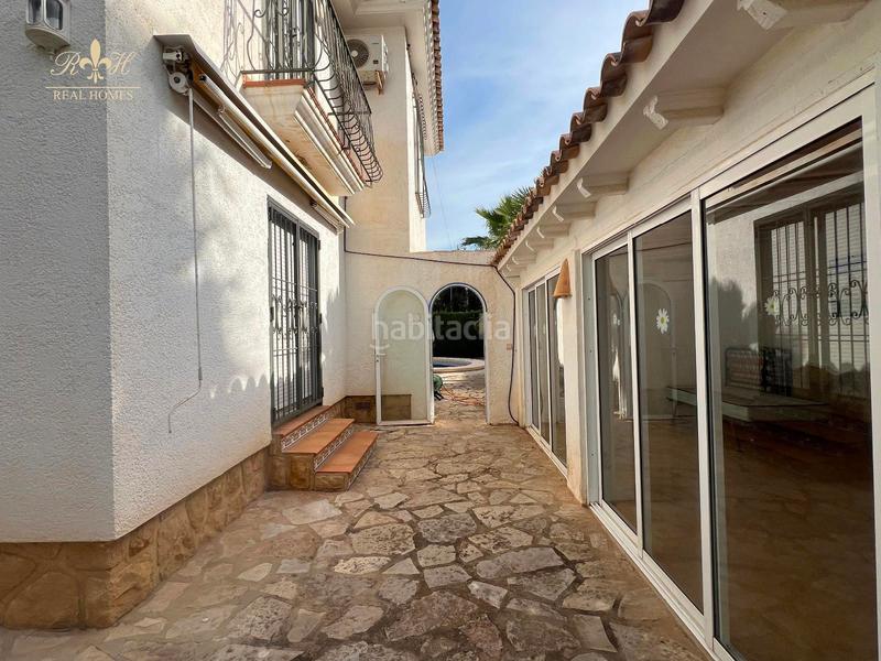 Foto 745b6318-bafb-4c69-8eb3-ff84000cf4cd. Chalet con riscaldamento parcheggio piscina in L´Albir Alfàs del Pi (l´)