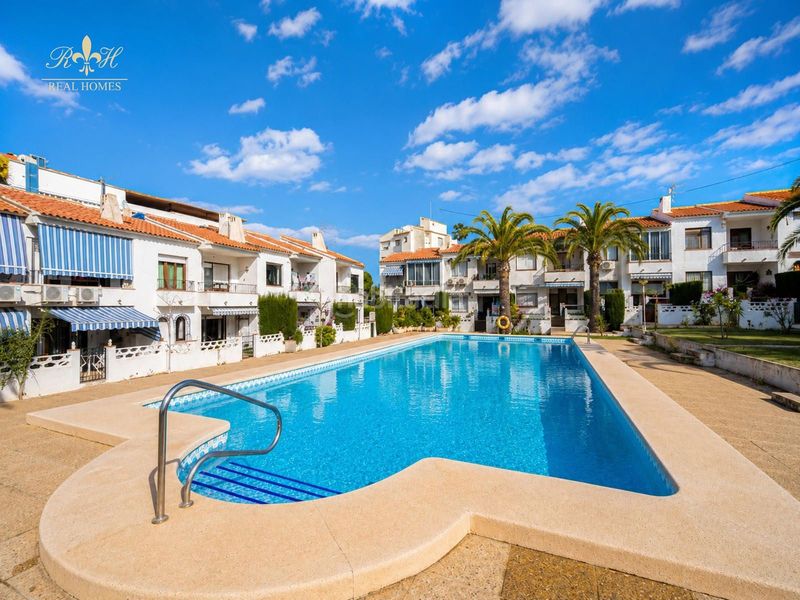Foto b0e589fe-e971-4cf4-901e-5f5c0d862763. Reihenhaus mit parking pool in L´Albir Alfàs del Pi (l´)