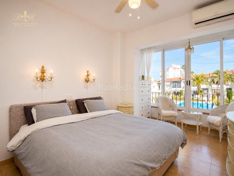 Foto f868b40d-125e-4d88-9429-d14680e4beec. Reihenhaus mit parking pool in L´Albir Alfàs del Pi (l´)