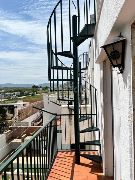 Foto 60a89fe7-a385-43c7-a0ef-cfd1b57bbae0. Maison jumelée dans Playa Norte Peñíscola