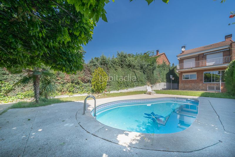 Foto 7115a2e5-26a8-4926-aa9f-d788b88ba47c. Casa aparellada amb xemeneia calefacció aparcament piscina a Torrelodones