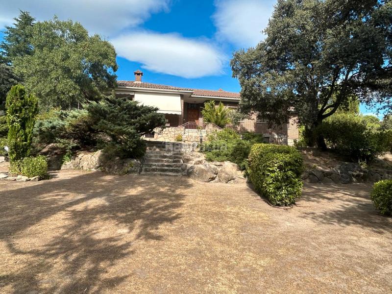 Foto 7b1a1f57-4623-40c9-89b4-d2590548d41c. Chalet con camino riscaldamento parcheggio piscina in Torrelodones