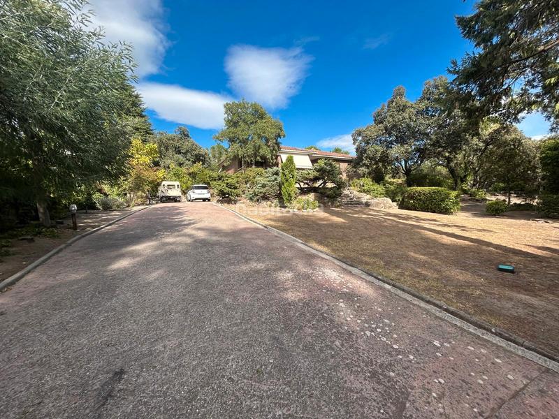 Foto b1695994-0823-42dc-b0a4-249865f4a486. Chalet con camino riscaldamento parcheggio piscina in Torrelodones