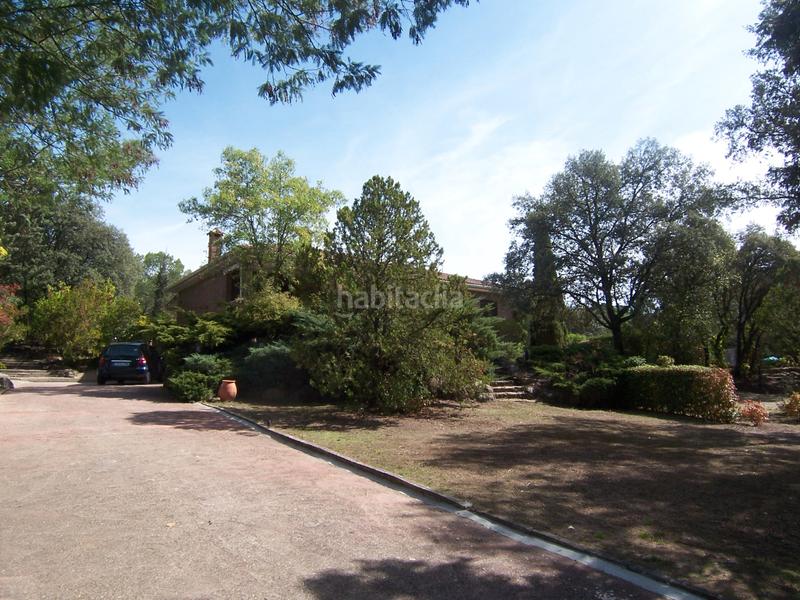Foto b6493ce2-d846-498e-a353-bc34fabd685a. Chalet con camino riscaldamento parcheggio piscina in Torrelodones