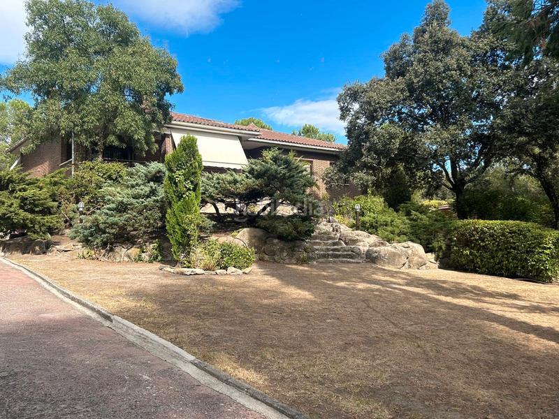 Foto cc43e23b-6e83-45b4-8b53-5c894e91ade6. Chalet con camino riscaldamento parcheggio piscina in Torrelodones